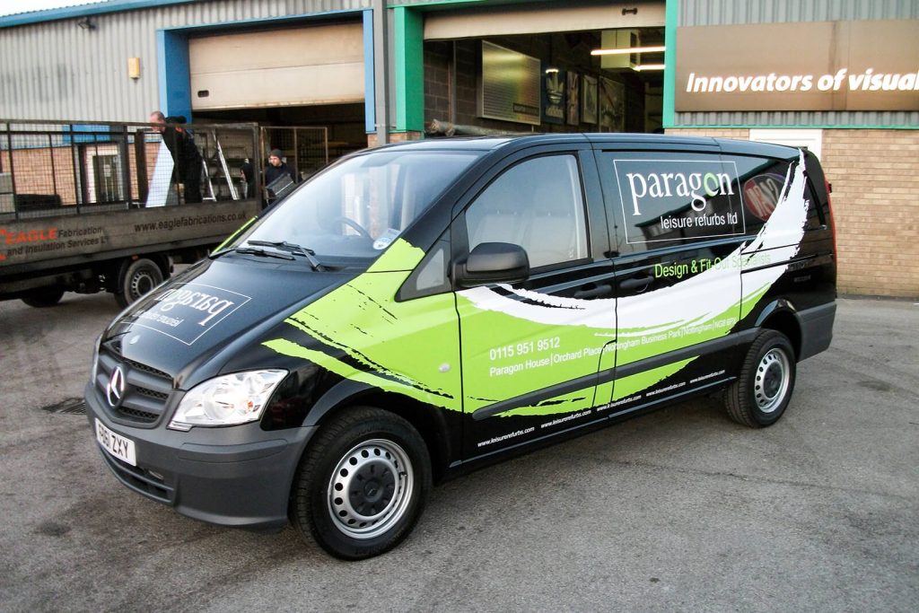 Vehicle Graphics to Mercedes Paragon van outside building.