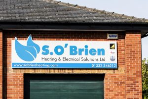 Local Heating & Electrical Business signage in Derby