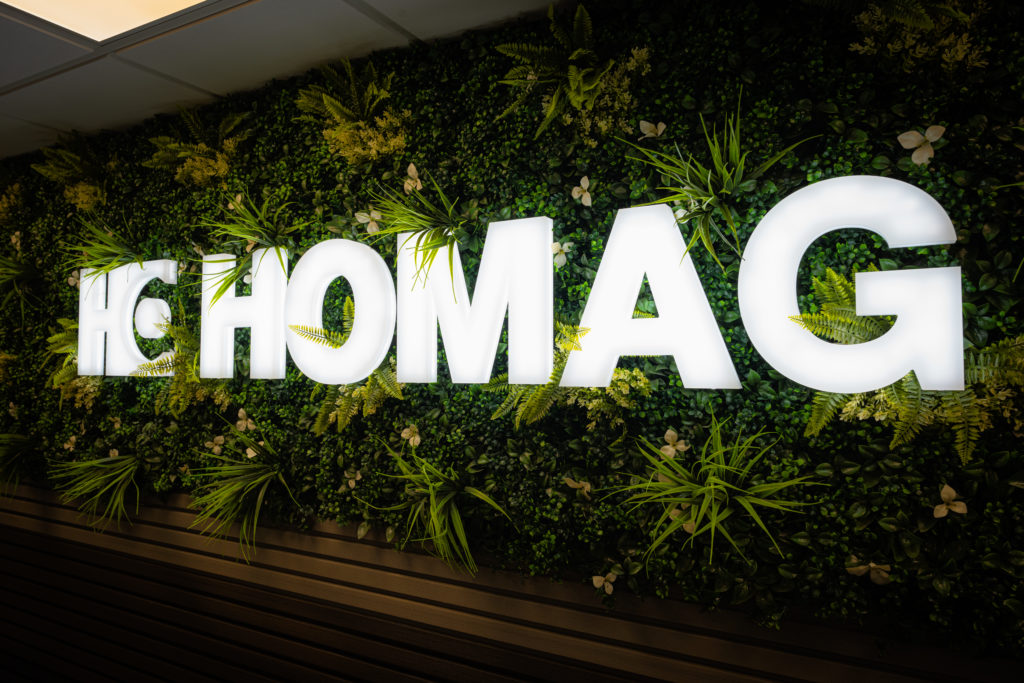 Acrylic Illuminated internal sign at Homag reception area.